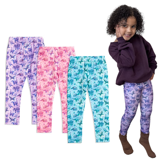 Child wearing patterned leggings with three additional pairs displayed on a white background.