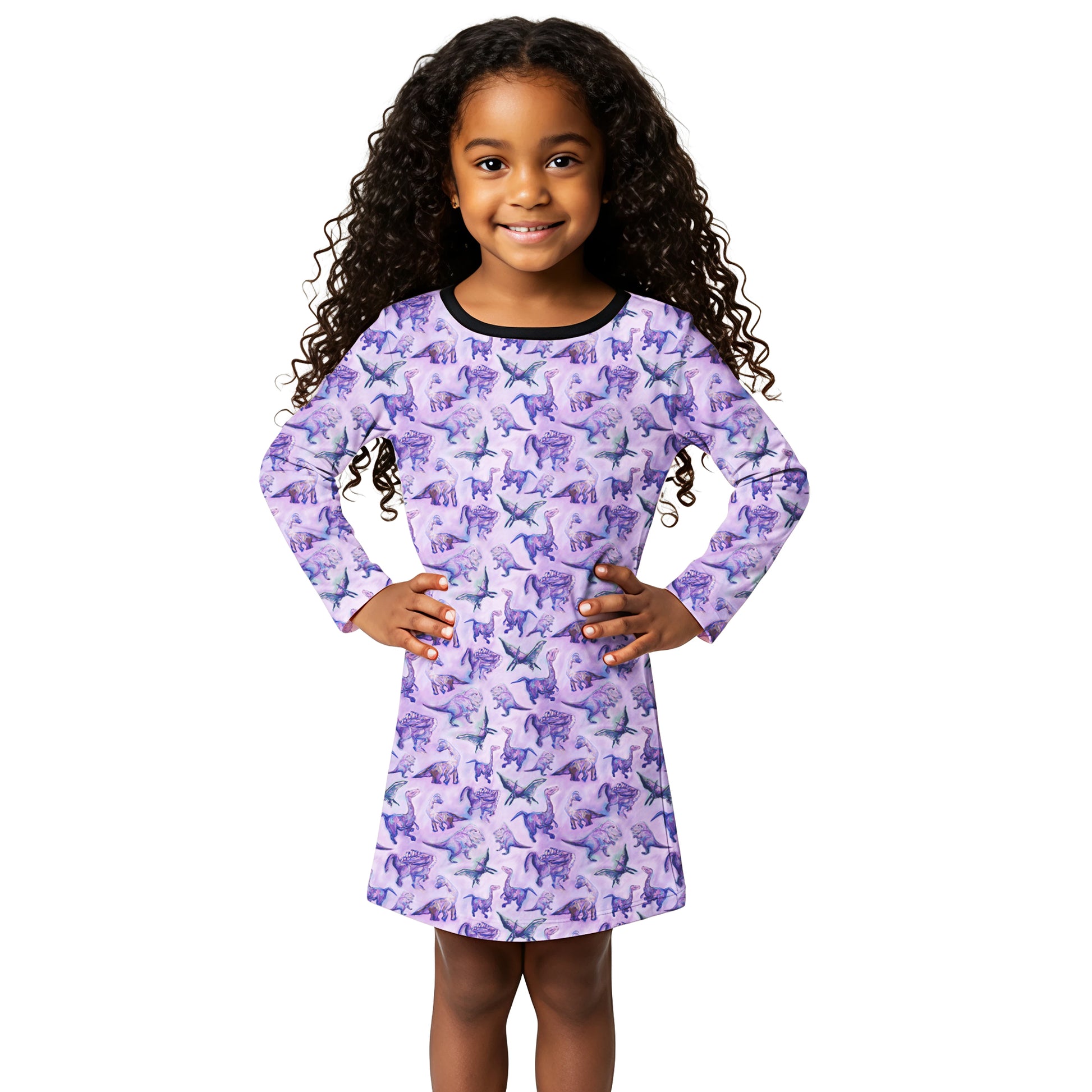 Young girl wearing a purple dress with dog pattern on a white background