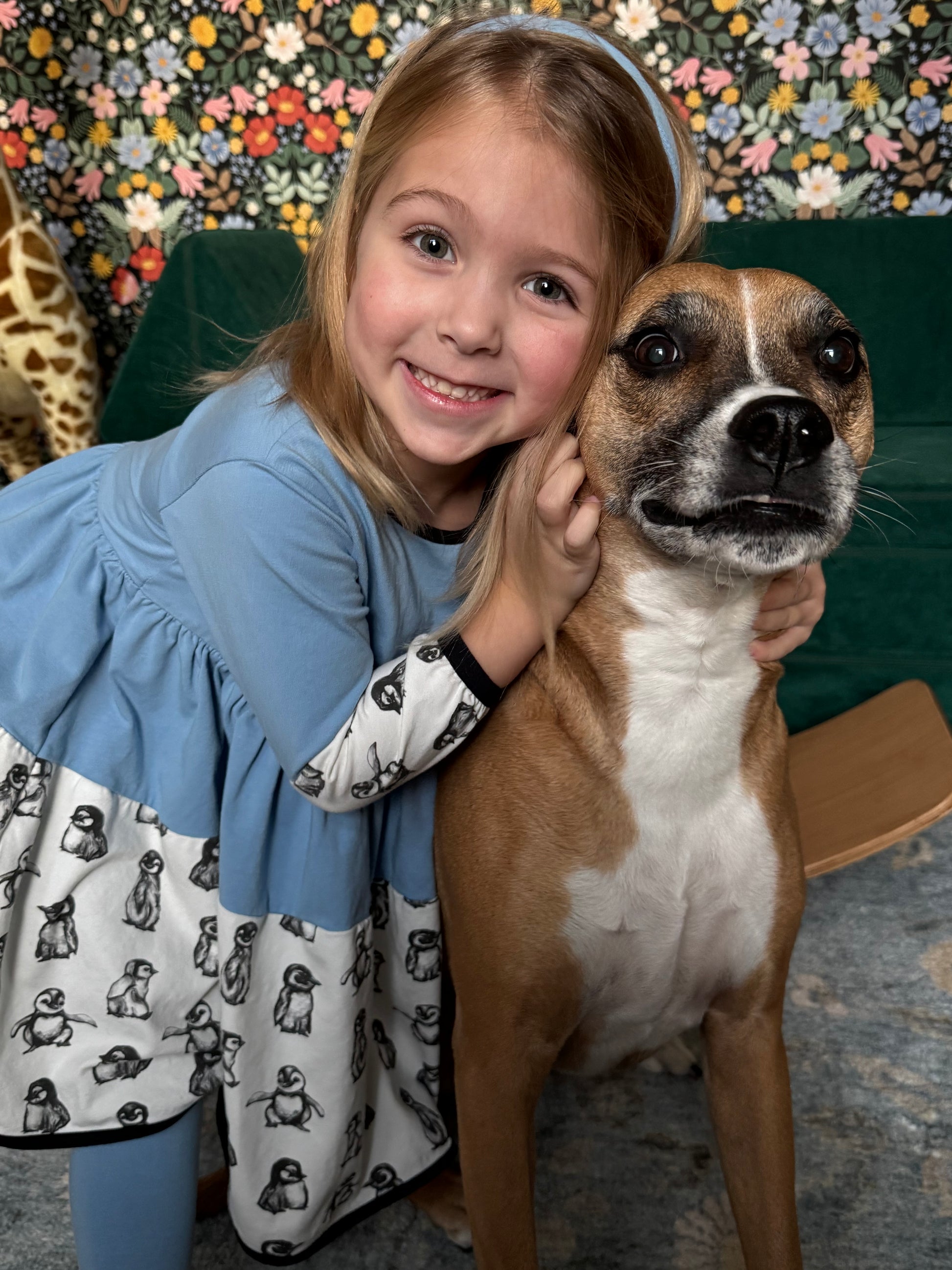 Happy Little Girl With a Dog