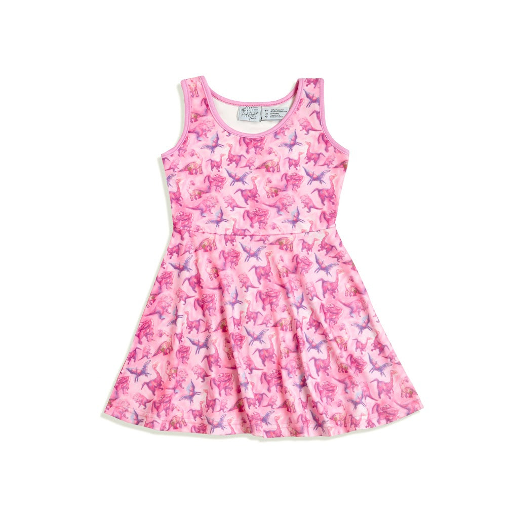 Flat lay of pink sleeveless dinosaur dress for toddler girls with soft, sensory-friendly fabric and vibrant dino print