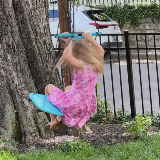 Video of toddler girl twirling and playing in pink dinosaur sleeveless dress – soft, sensory-friendly fabric for summer